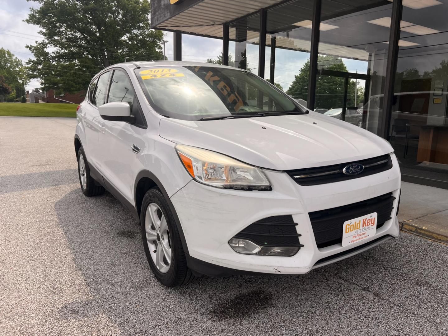 2013 Oxford White Ford Escape SE 4WD (1FMCU9GX9DU) with an 1.6L L4 DOHC 16V engine, 6-Speed Automatic transmission, located at 1633 W Kimberly, Davenport, IA, 52806, (563) 323-5341, 41.559456, -90.598732 - Photo#2